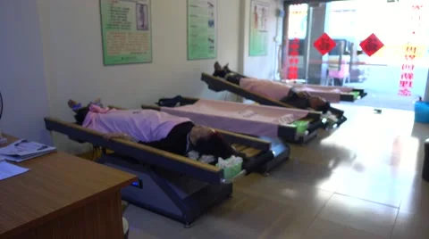 Swing feet,teasing spine,new style physical therapy,china Stock Footage 57671760