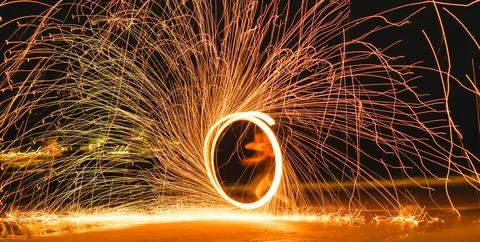Swing fire dancing show on the beach .Koh Samet, Thailand Stock Photos