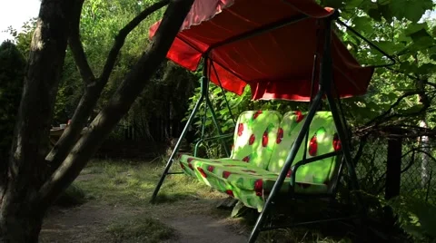 Swing in the garden Stock Footage 52372853