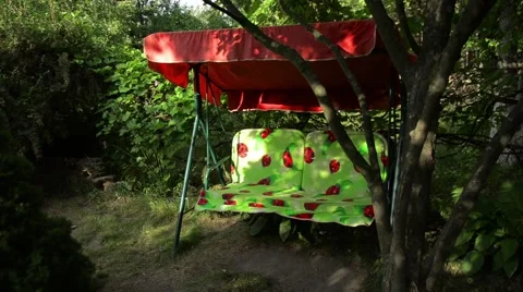 Swing in the garden Stock Footage 52372931