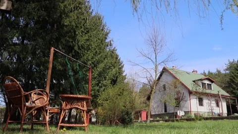Swing in the garden Video stock 148236805