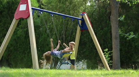 Swing hit the boy's head Stock Footage 52431148
