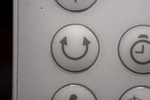 Swing icon and button close up of an air conditioner remote controller Stock-Fotos