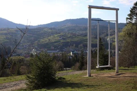 Swing in the mountains 1 Stock Photos