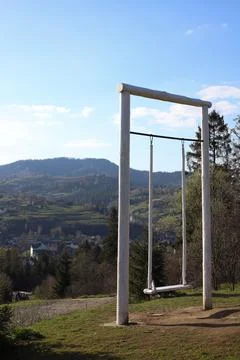 Swing in the mountains Stock Photos