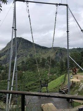 Swing in the mountains Stock Photos