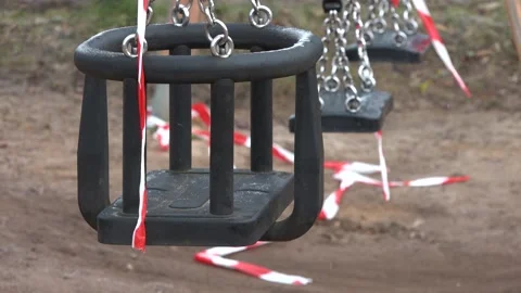 Swing moves. Close up. The playground is closed Stock Footage 151499857