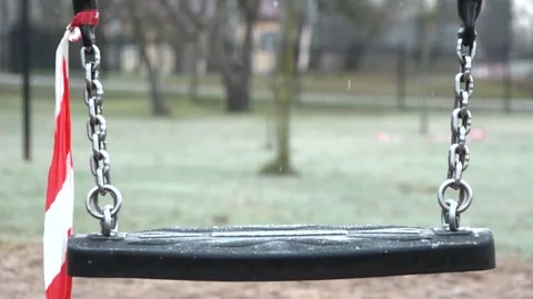 Swing moves. Close up. The playground is closed Stock Footage 151499877