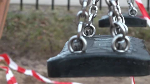 Swing moves. Close up. The playground is closed Stock Footage 151499889