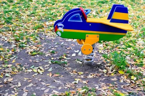 Swing-plane on the Playground Stock Photos