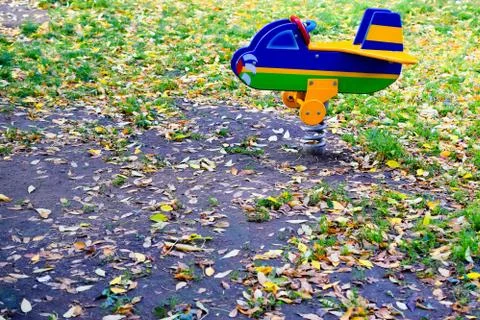 Swing-plane on the Playground Stock Photos