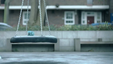 SWING IN PLAYGROUND Stock Footage 141009080