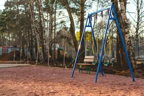 Swing on the playground Stock Photos