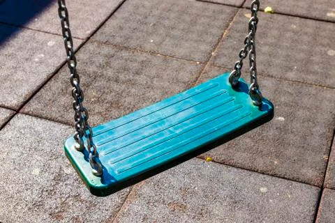 Swing on playground Stock Photos