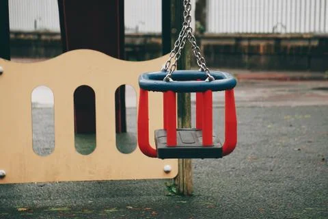 Swing in the playground Stock Photos