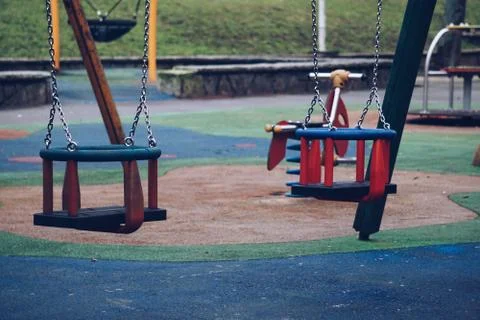 Swing in the playground Stock Photos