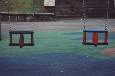 Swing in the playground Stock Photos