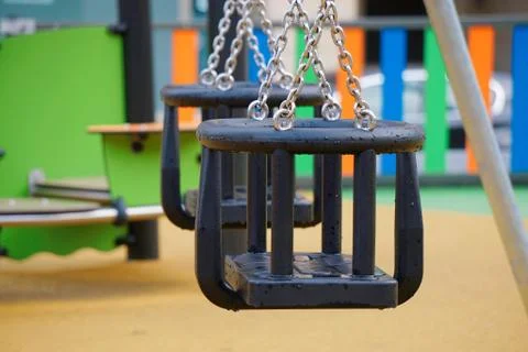 Swing in the playground Stock Photos