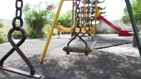 Swing playground swinging slow motion Stock Footage 76886874