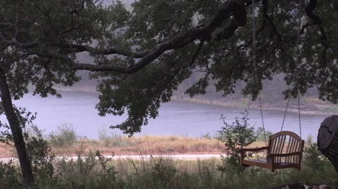 Swing in the rain Stock Footage 60754882