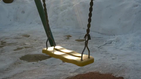 Swing on rope chain playground winter Stock Footage 266398035