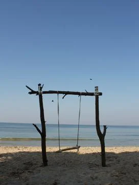 A swing by the sea Stock Photos