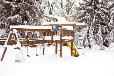 Swing set after a blizzard Stock Photos