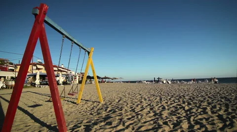 Swing set on a beach Stock Footage 52993021