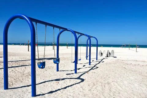 Swing Set on the Beach Stock Photos