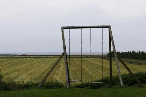 Swing set on the farm Stock Photos