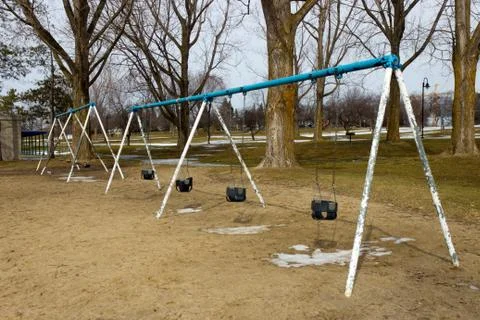 Swing set on the playground Stock Photos