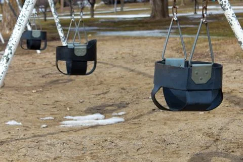 Swing set on the playground Stock Photos
