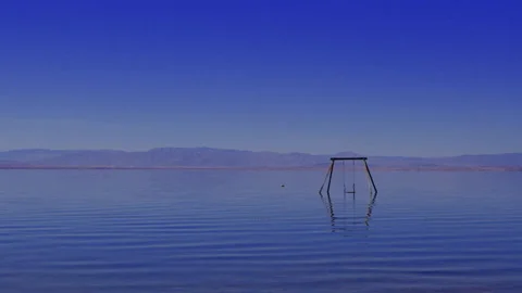 Swing set in the water 動画素材 246939684