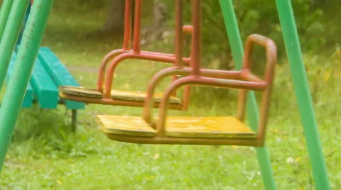 Swing shakes on playground Stock Footage 45178833
