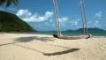 Swing on the shore of a beautiful island. Video with stereo sound HD Footage