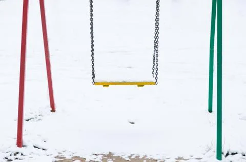 Swing in snow Stock Photos