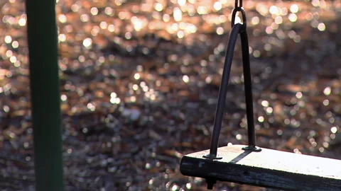 Swing Swaying in a Rustic School Playground, Chubut, Argentina - Close Up Stock Footage 301655120