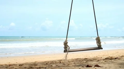 Swing on Tropical Beach by the Ocean Vídeos de archivo 337969583