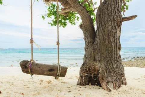 Swing on the white beach Stock Photos