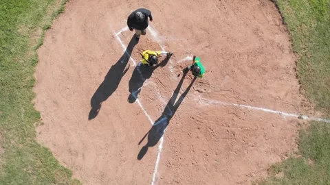 Swinging batter missing pitches at plate, catcher collecting mitt, umpire Stock Footage 344946197