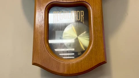 Swinging Clock Pendulum Close-Up Stock Footage 289267792