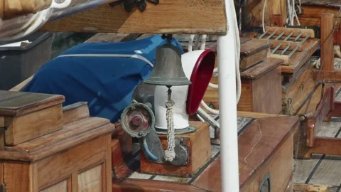 Swinging deck of a sailing ship with ship's bell Vídeos de archivo 258553737