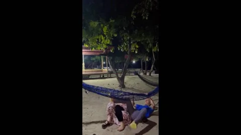 Swinging fail: a romantic video gone wrong on Pari Island 動画素材 280803710