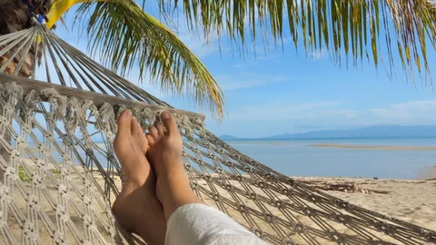 Swinging in a hammock Stock Footage 129303286