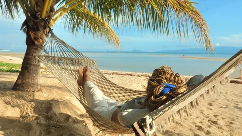 Swinging in a hammock Stock Footage 129321911