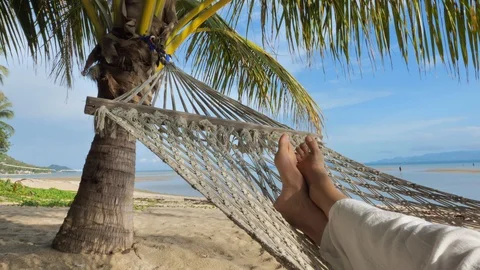 Swinging in a hammock Stock Footage 129322439