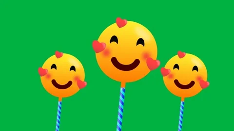 Swinging heart shape and blushing emoji isolated on green screen Stock Footage 284149376
