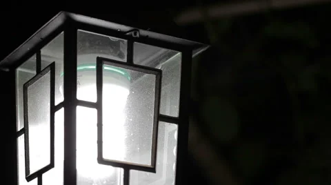 Swinging lamp at night Stock Footage 51110818