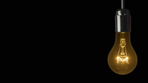 Swinging light bulb a black background Stock-Footage 86111988