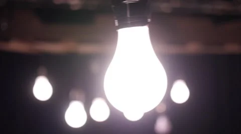 Swinging Light Bulb Video stock 52354946